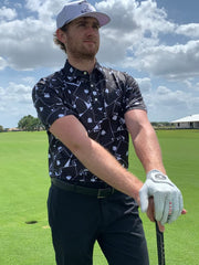 SHANKITGOLF glove worn during swing demonstrating secure grip benefit