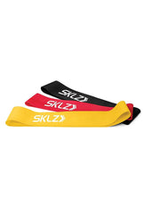 SKLZ mini resistance bands front view showing all three colors and portability benefit