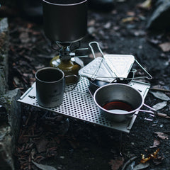 Snow Peak Ozen Solo Table in use with stove illustrating stable cooking platform benefit