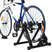 SPORFIT trainer stand front view showing stable steel frame and secure attachment benefit