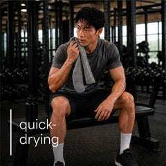S&T INC. towel draped on gym bench protecting equipment and absorbing sweat