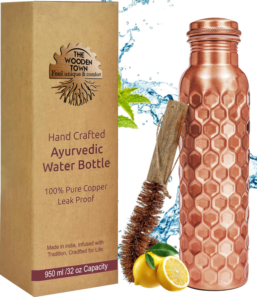 The Wooden Town copper bottle front view showing elegant diamond finish and portability