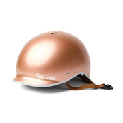 Thousand helmet front view in rose gold showing sleek retro style and commuter appeal