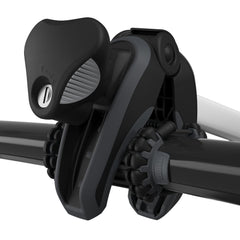 Thule carbon frame protector mounted on rack holding a bike securely during transport