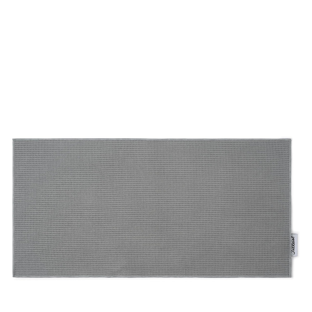 Titleist players towel front view showing gray color and woven logo, professional finish benefit