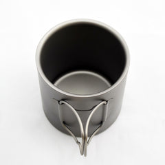 TOAKS cup nested with pot demonstrating space-saving camp cookware packing