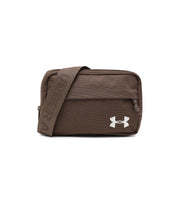 Under Armour front view of brown waist bag showing compact silhouette and zippered pocket for quick access