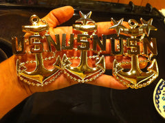 Unknown brand anchor mounted on uniform demonstrating proper placement and presentation