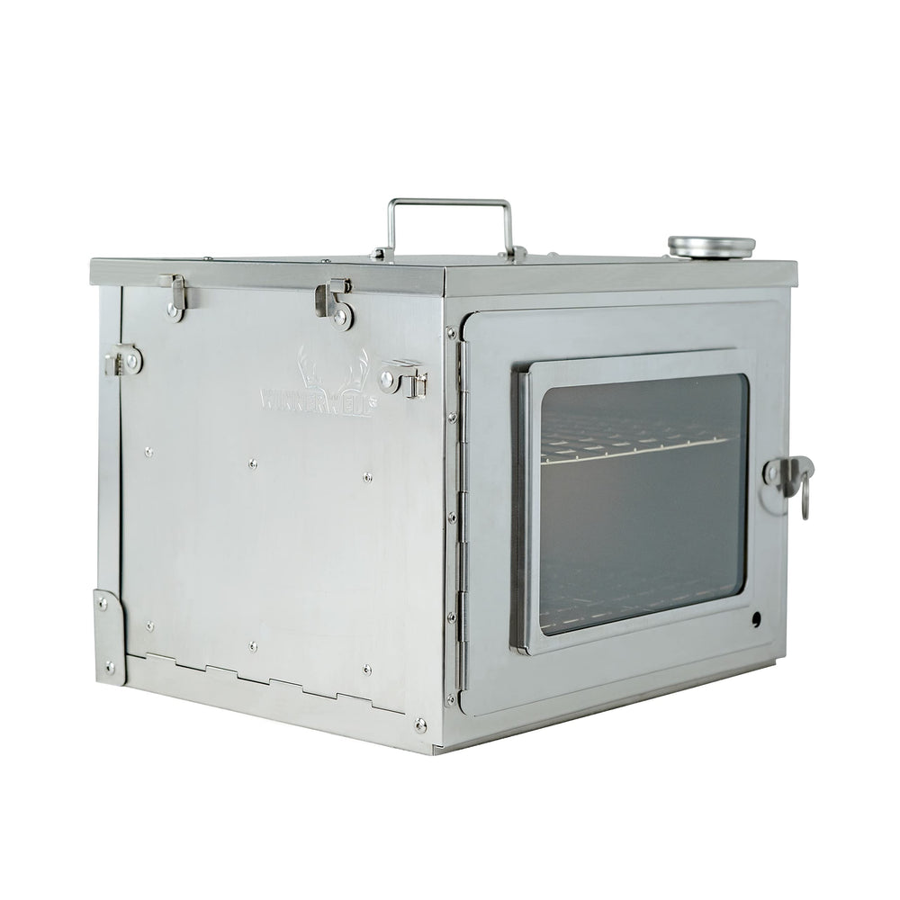 WINNERWELL front view of compact folding oven showing door and handle benefit portability