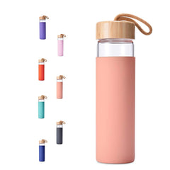 Yomious glass bottle front view showing sleek design and clarity benefit