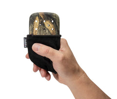Zippo Realtree Edge in jacket pocket lifestyle shot demonstrating easy carry and steady heat