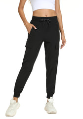 zsenoxaxi front view showing clean black jogger styling and secure pockets benefit
