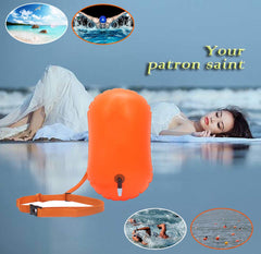 Acazmpar buoy trailing behind swimmer in open water showing safety benefit