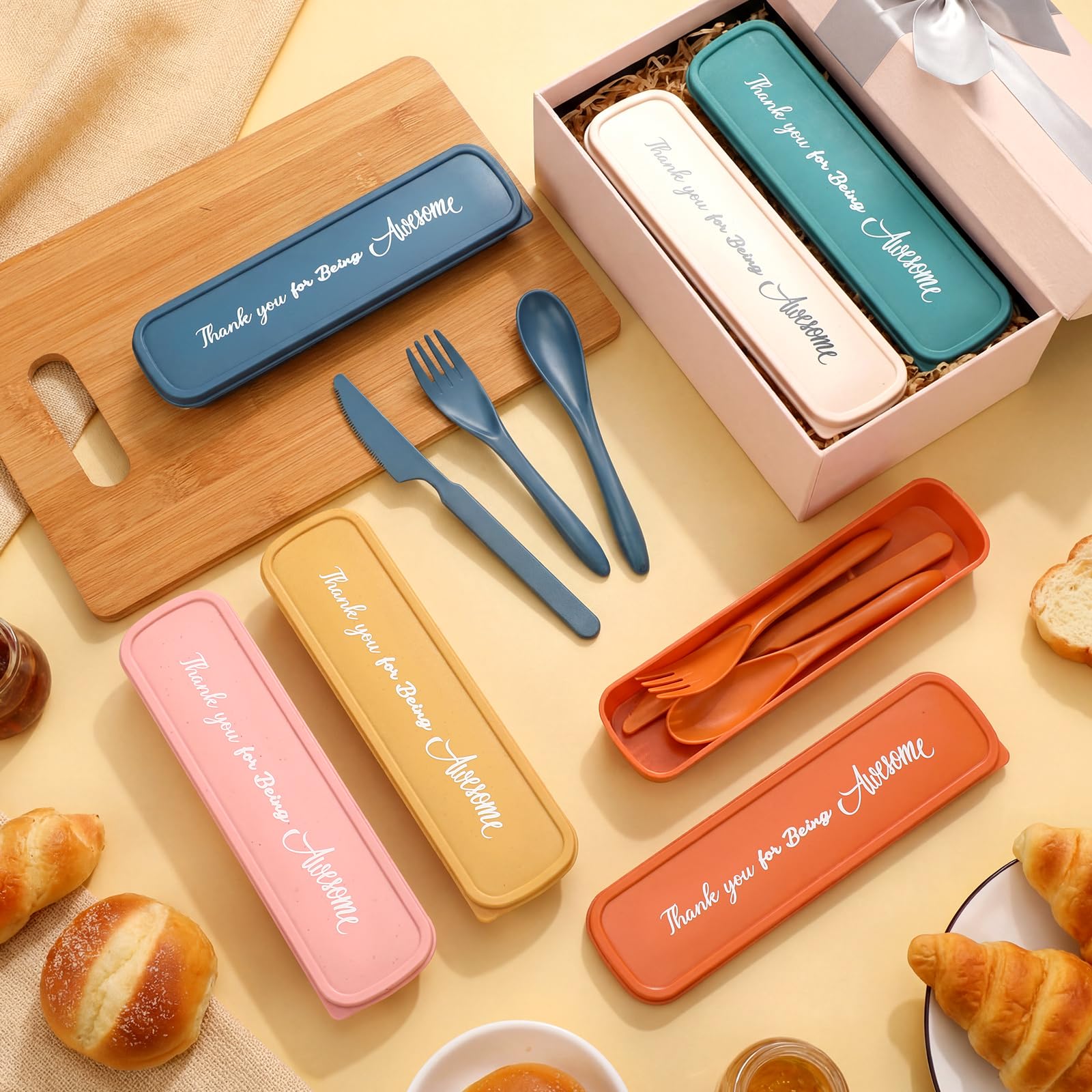 Acellegic utensils held in a hand to show scale and comfortable, travel-friendly dimensions