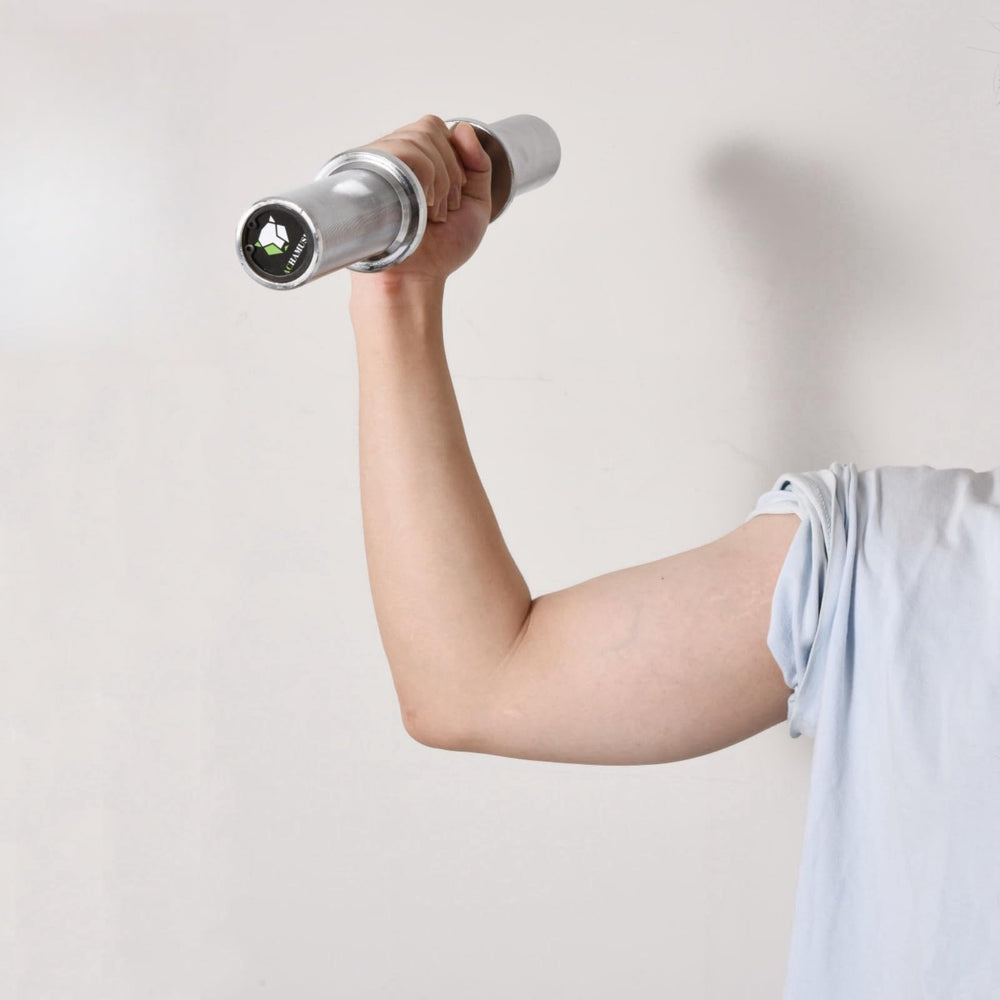 Achamusi handles in use in a home gym showing quick plate changes and workout flow
