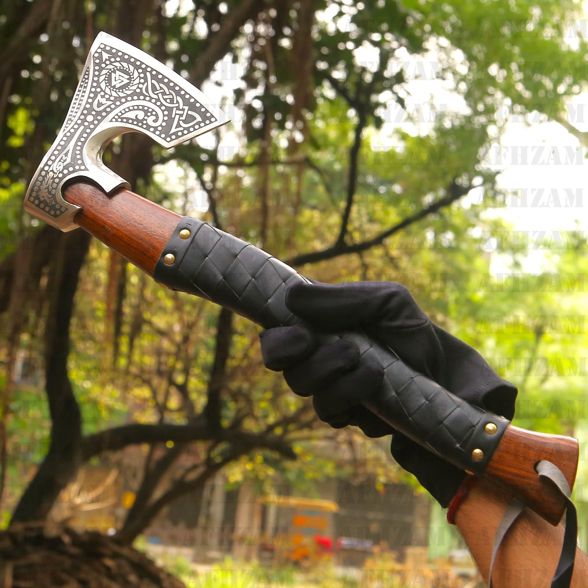 Afhzam axe held in hand showing true scale and handling confidence