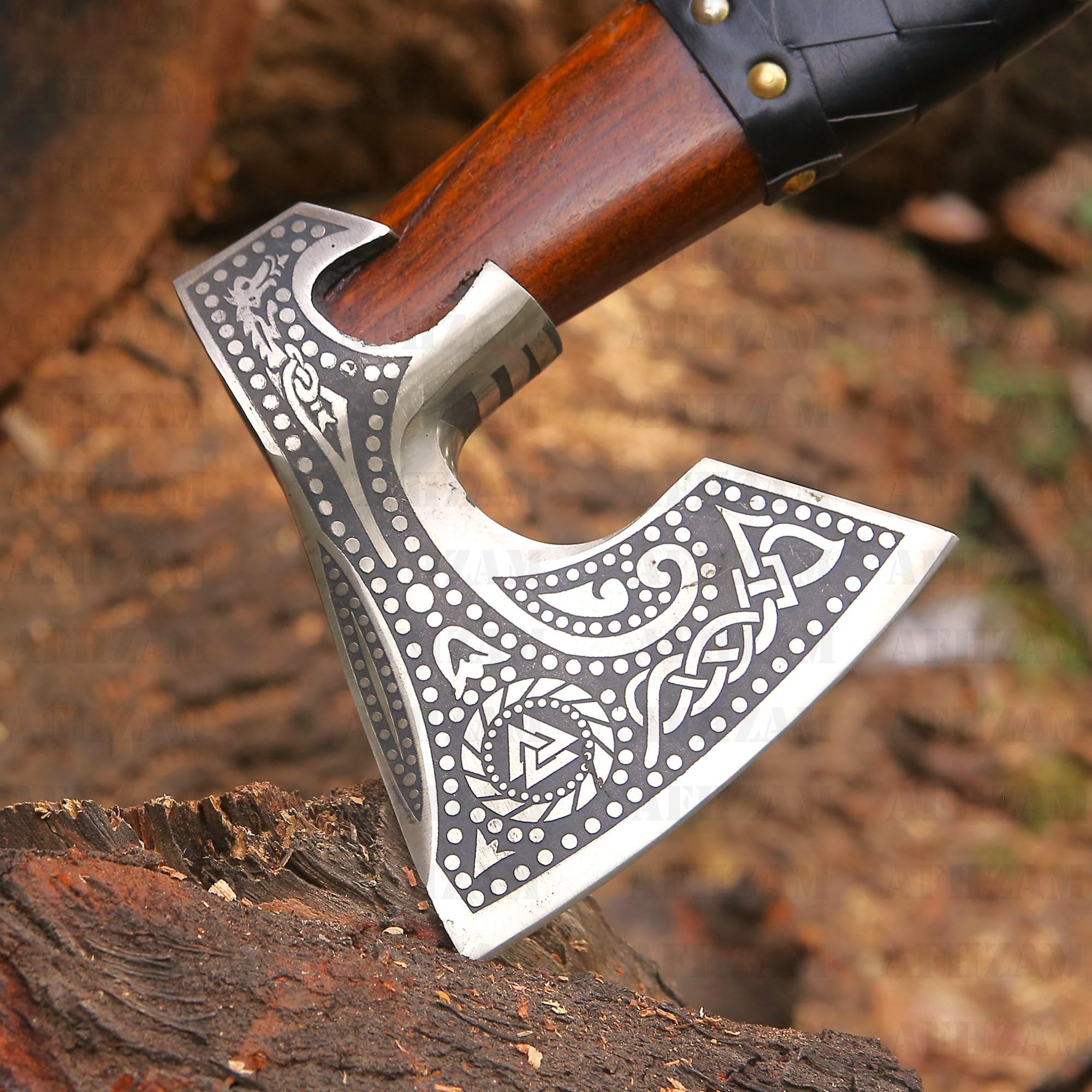 Afhzam axe and knife set on wood table demonstrating rustic lifestyle use