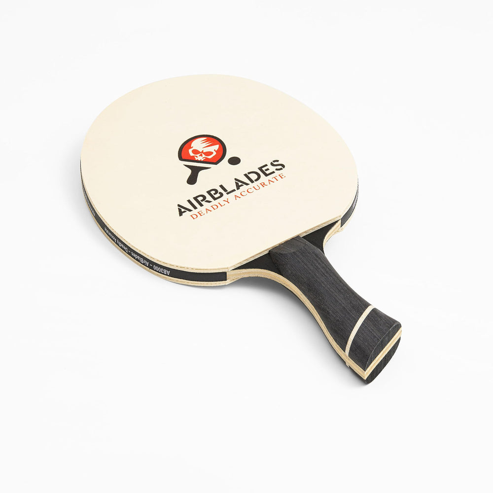 AirBlades paddle resting on table indicating ready-to-play condition