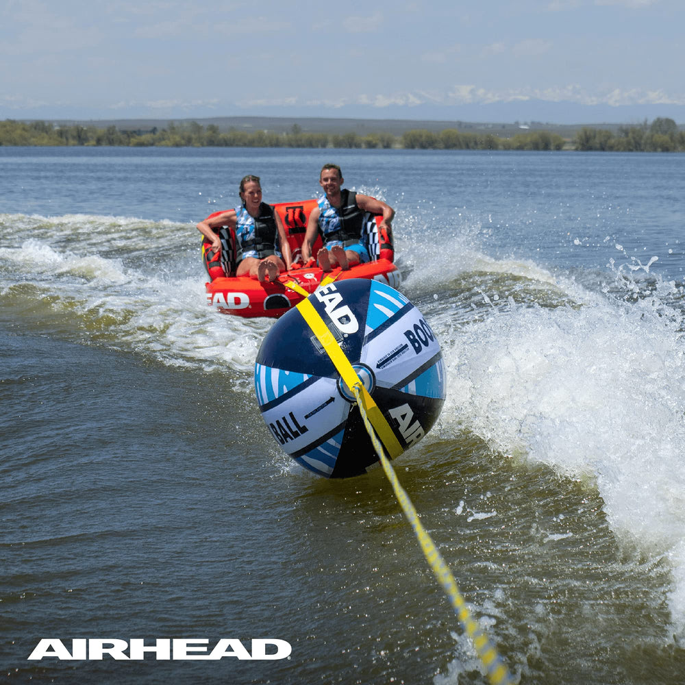 AIRHEAD Booster Ball floating on water reducing rope spray for cleaner tow benefit
