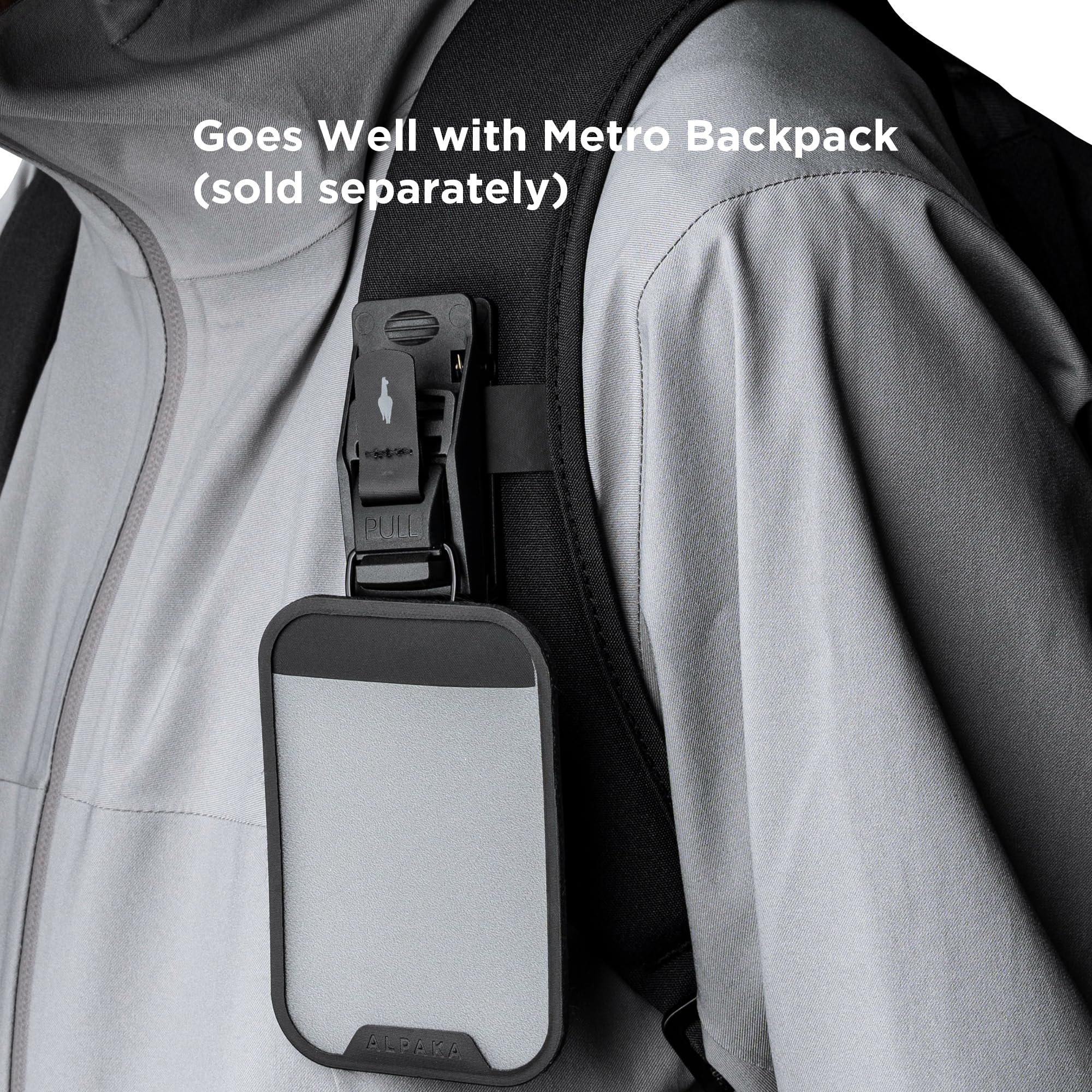 ALPAKA HUB clipped on backpack in lifestyle scene showing rugged everyday use