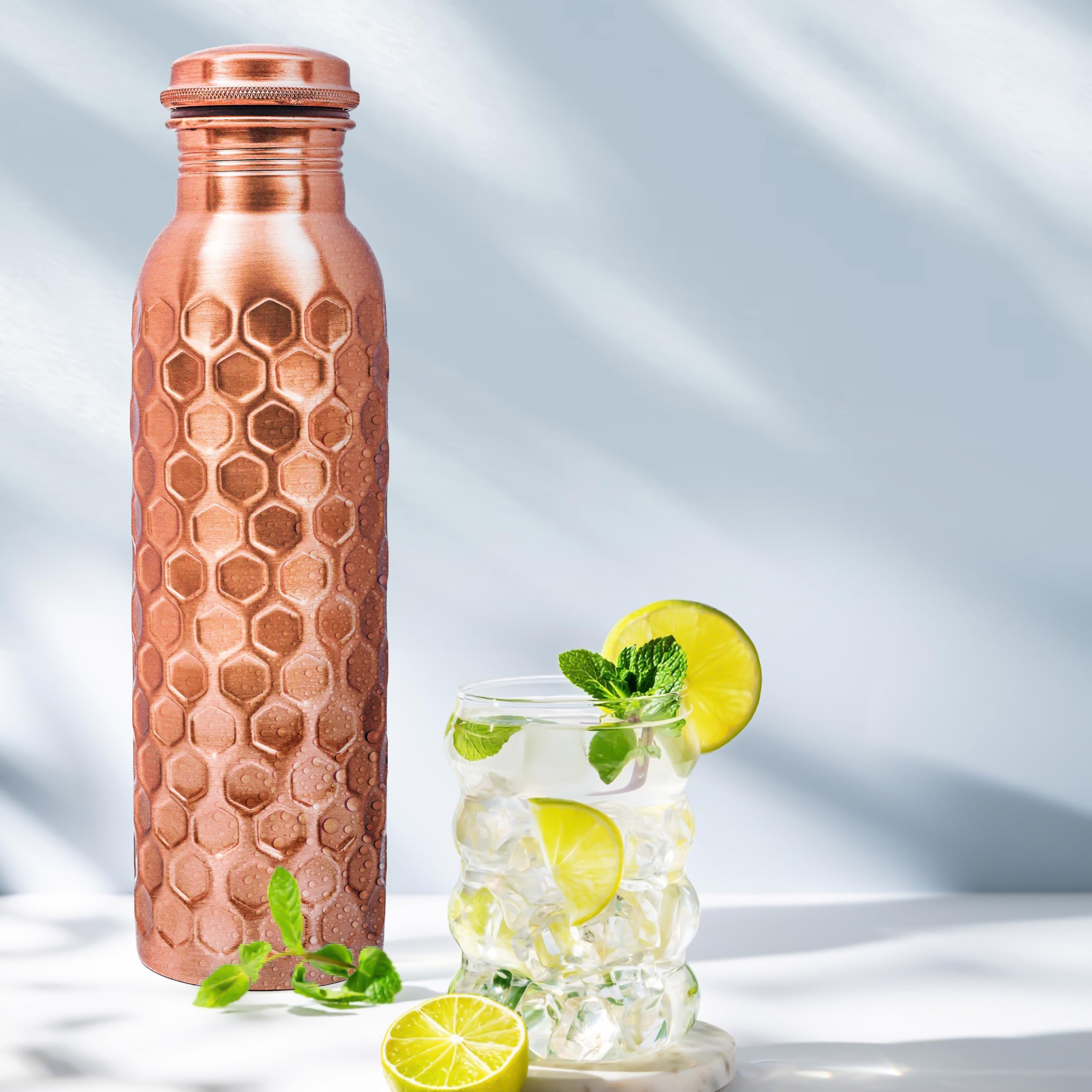 Alpha Living Home bottle next to measuring cup highlighting the 32 oz capacity