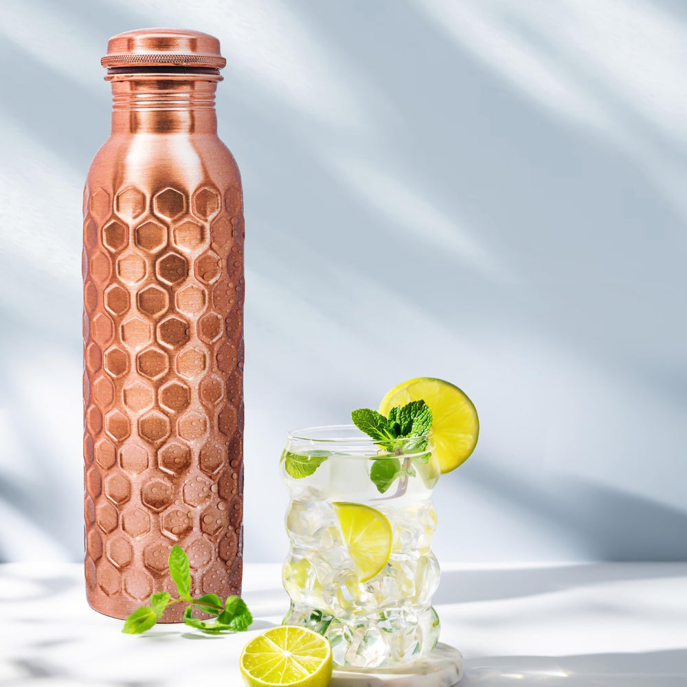 Alpha Living Home bottle next to measuring cup highlighting the 32 oz capacity