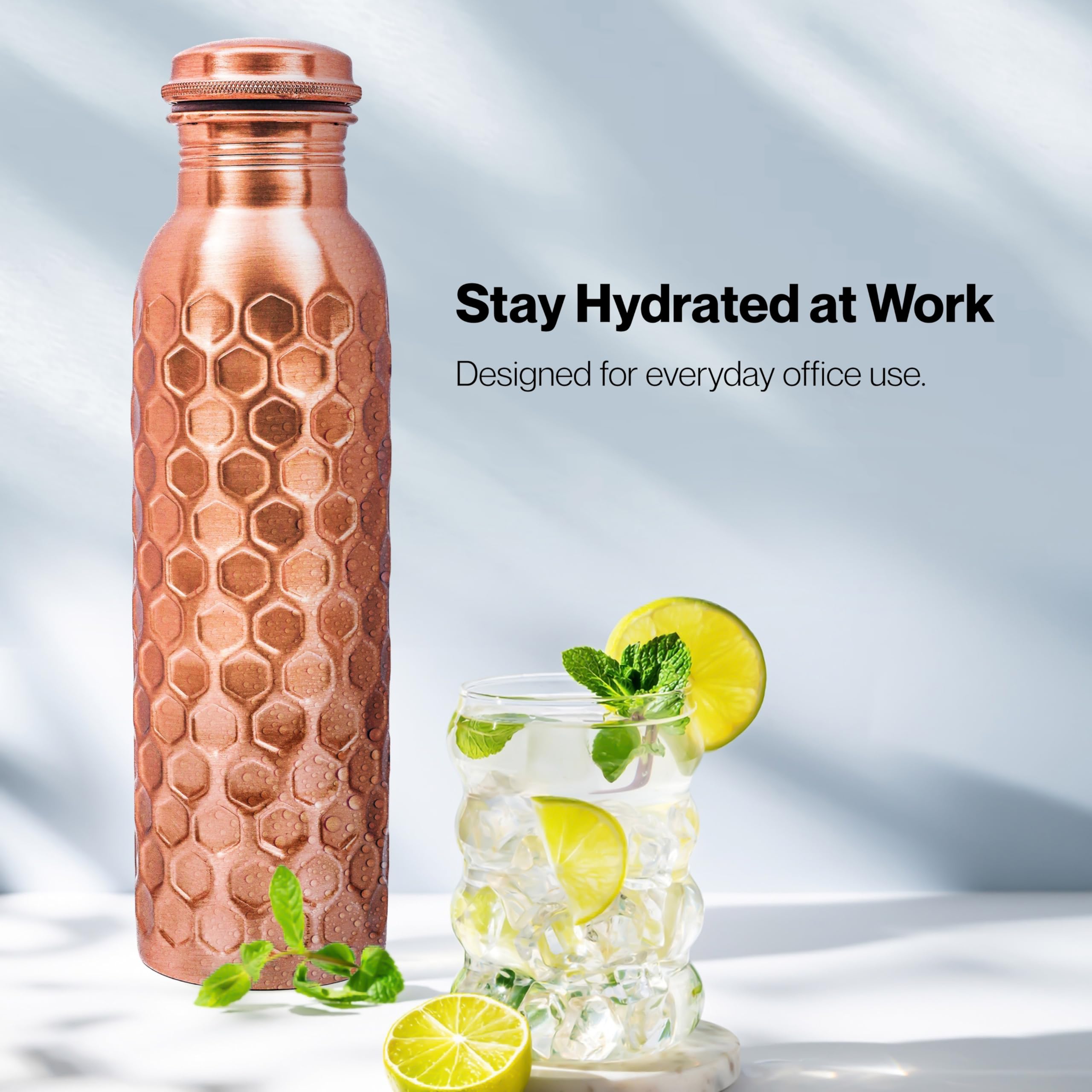 Alpha Living Home bottle beside yoga mat representing workout and studio use