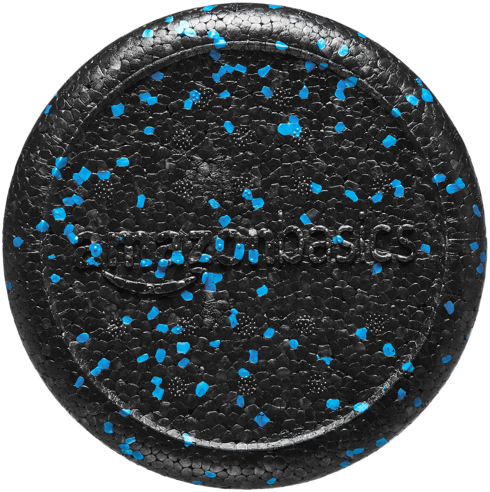 Amazon Basics foam roller in use for upper back release demonstrating effective relief