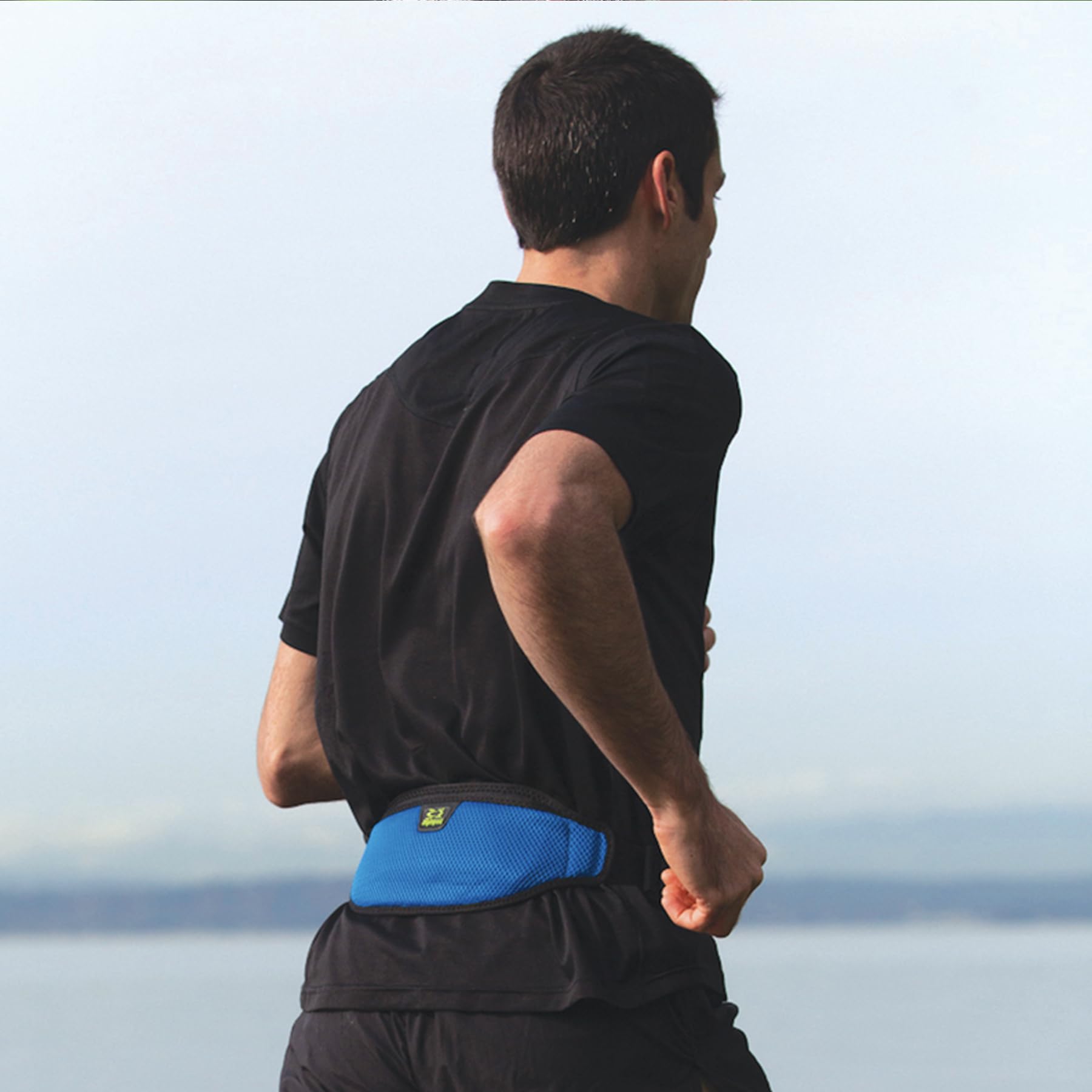 Amphipod worn by runner illustrating stable, low-profile carry during exercise
