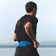 Amphipod worn by runner illustrating stable, low-profile carry during exercise