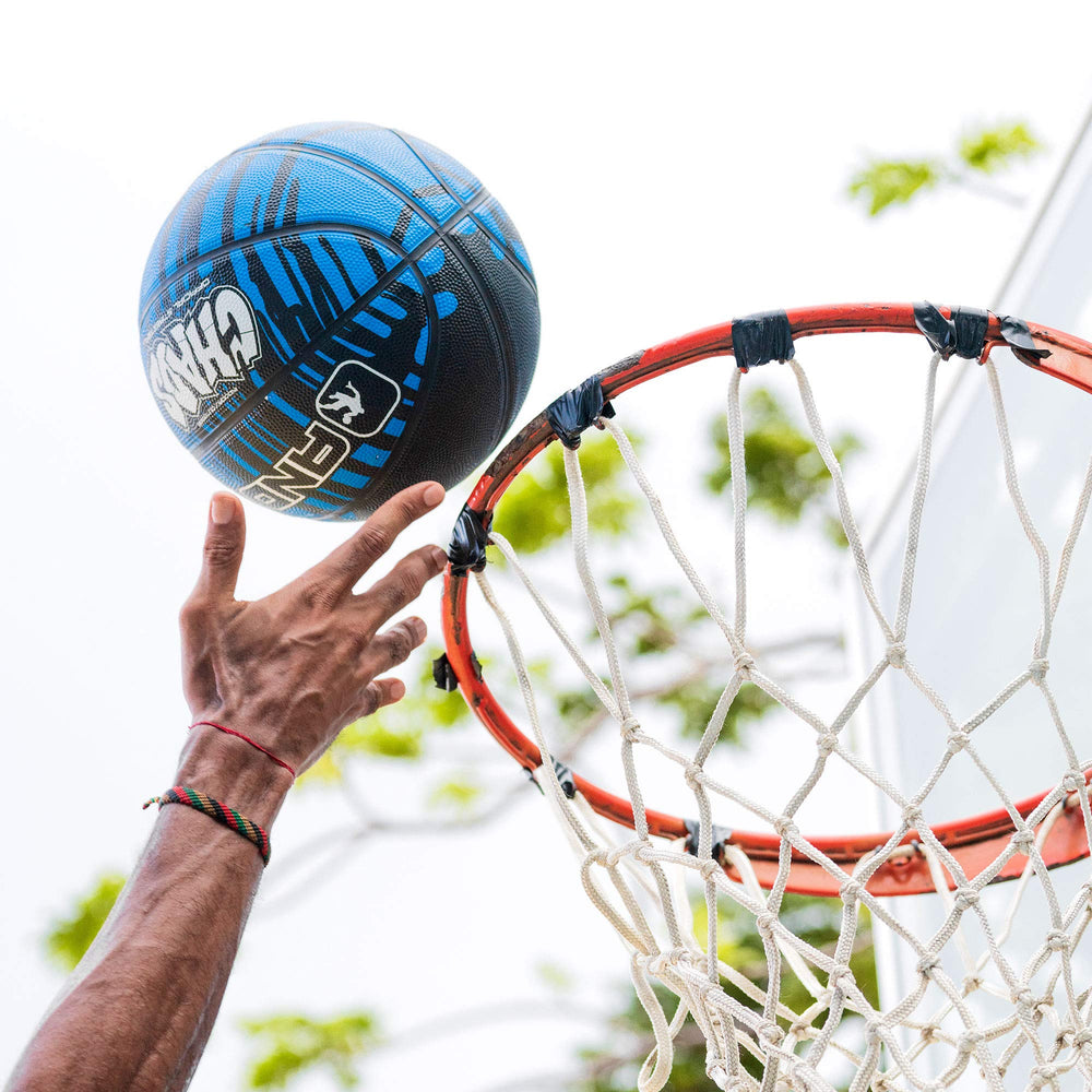 AND1 drip basketball in outdoor pickup game showing durable performance benefit