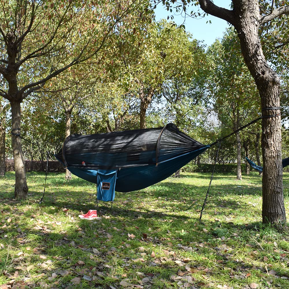 AnorTrek hammock hung between trees showing full size and stable support