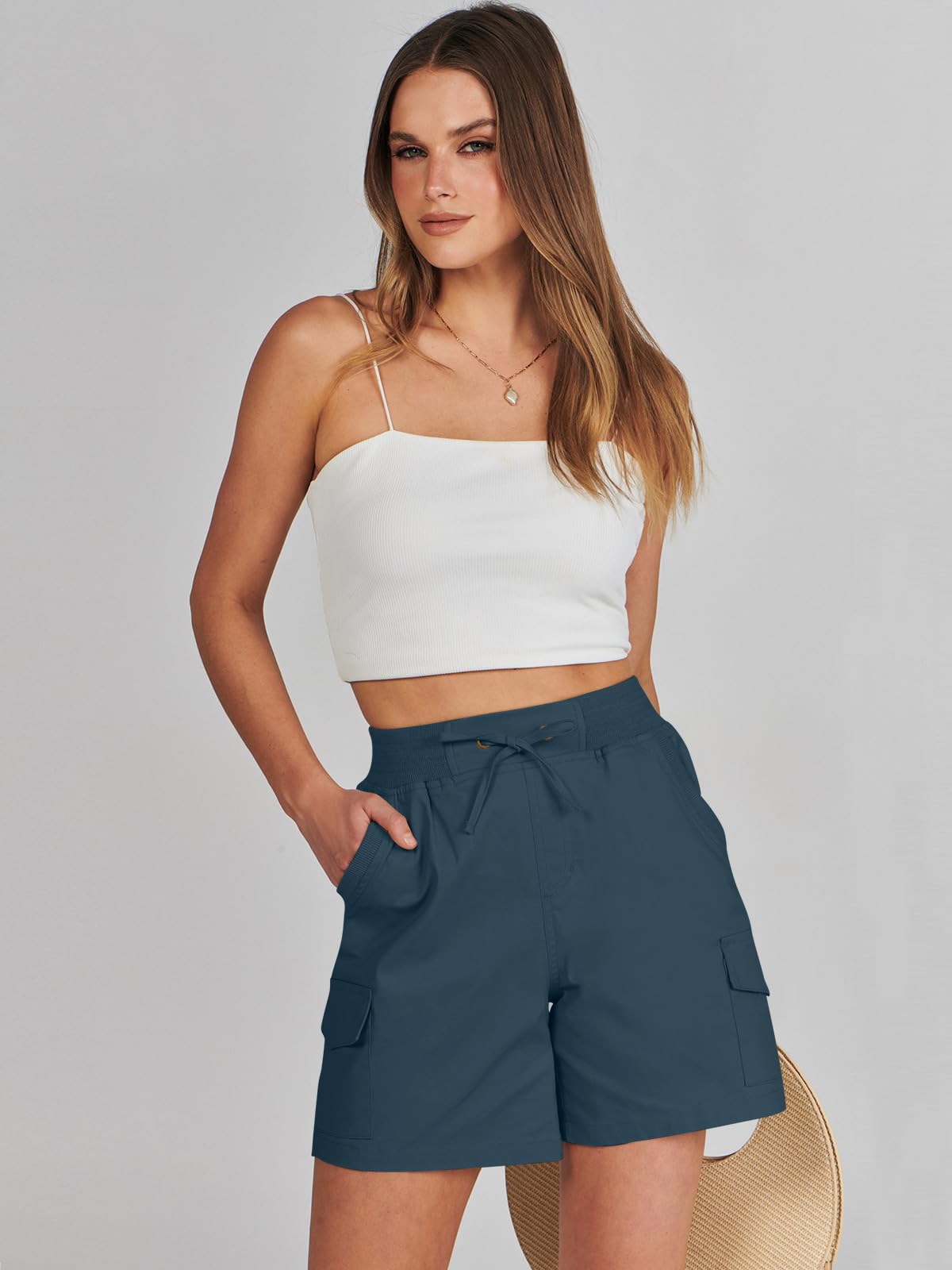 ANRABESS side profile on model demonstrates mid-thigh length and relaxed movement