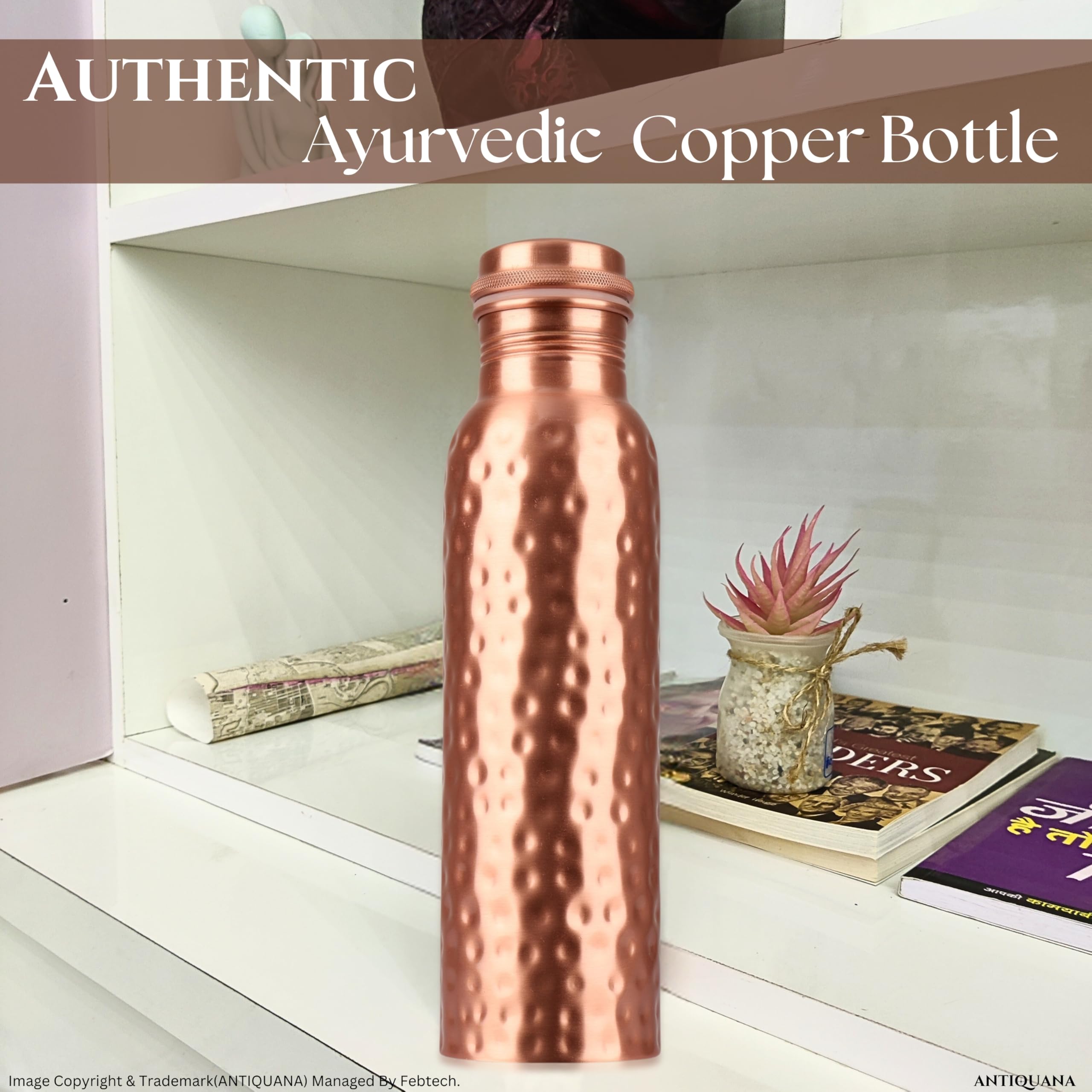 ANTIQUANA hand holding bottle to show scale and comfortable carry benefit