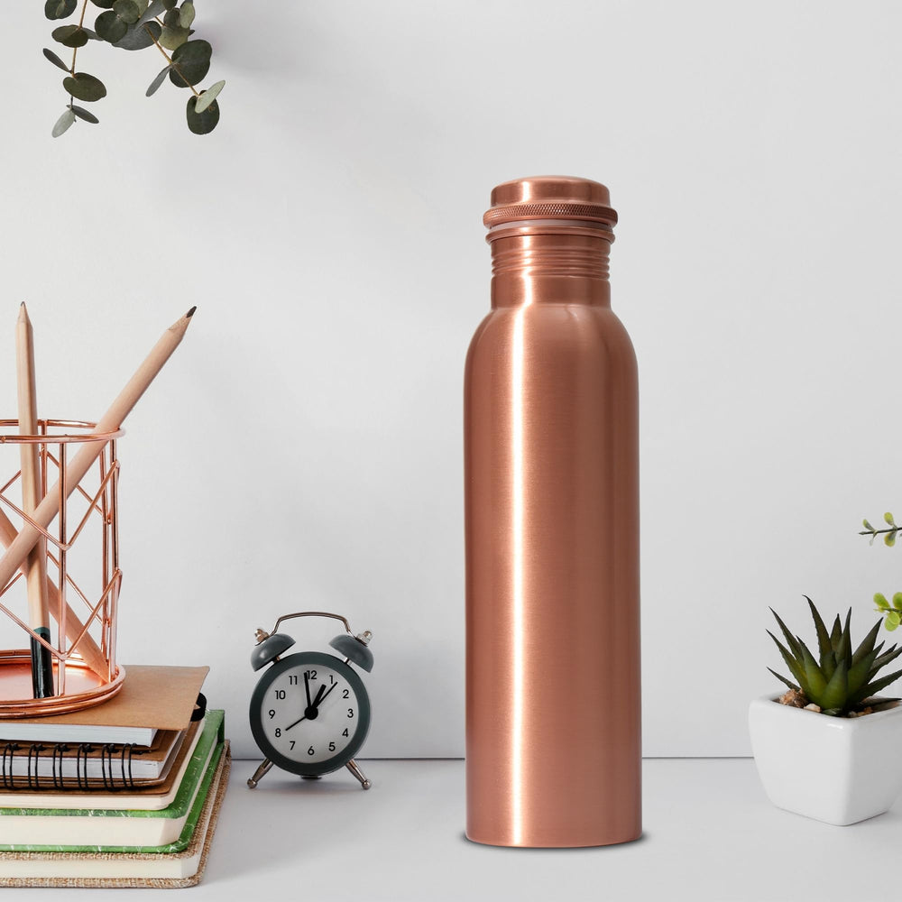 ANTIQIANA bottle next to ruler showing 34 oz capacity for daylong hydration