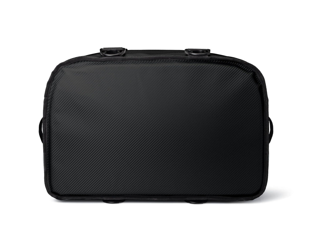 AO Coolers next to backpack showing size scale and space-saving benefit for travel