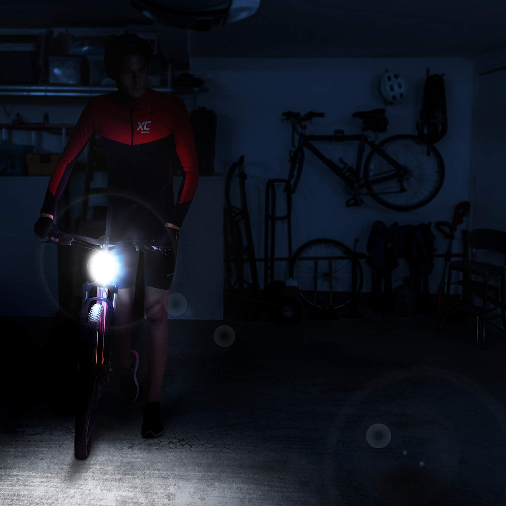 Apace Vision light in rain illustrating IPX5 water resistance and durability