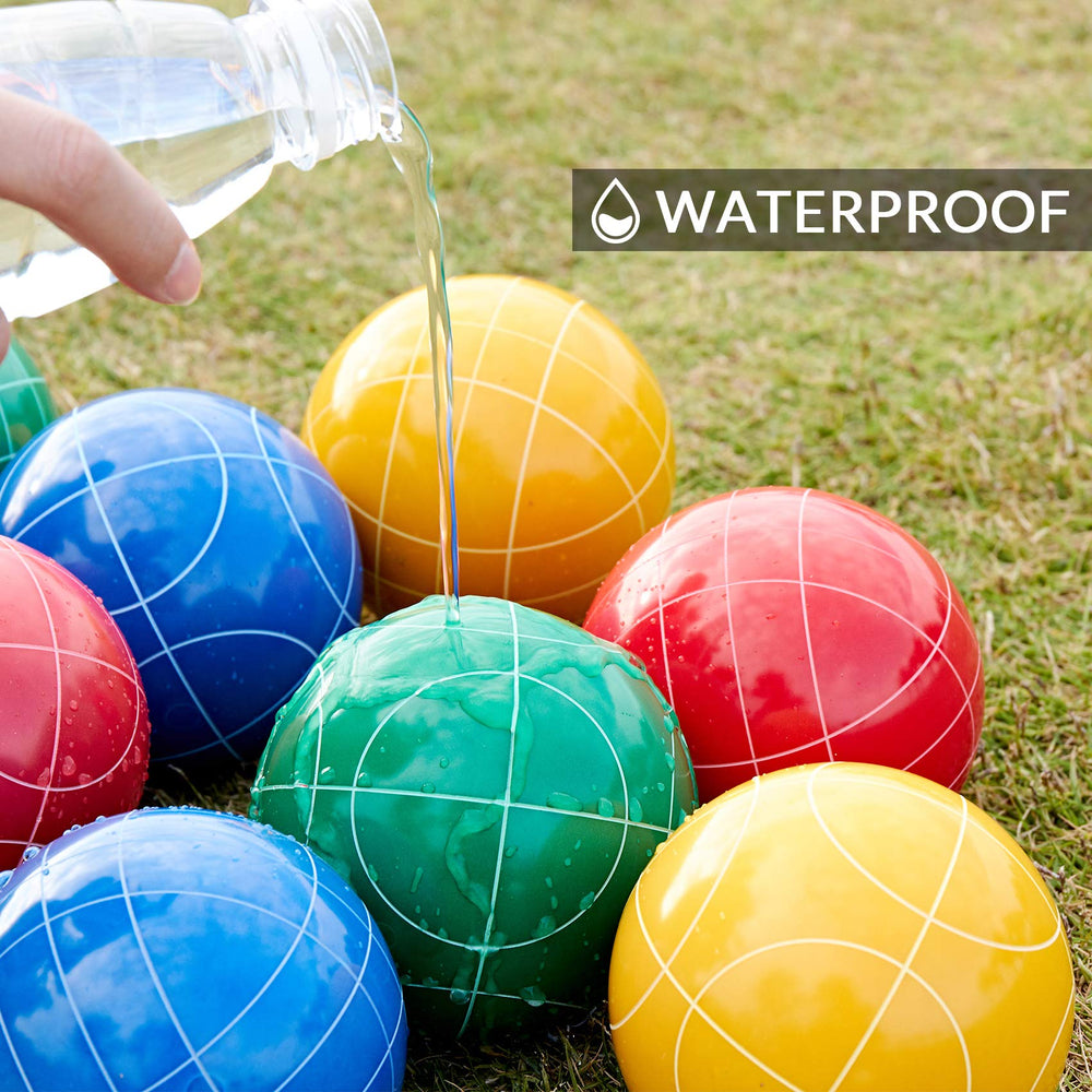 ApudArmis bocce balls mid-roll on grass showing durable outdoor performance