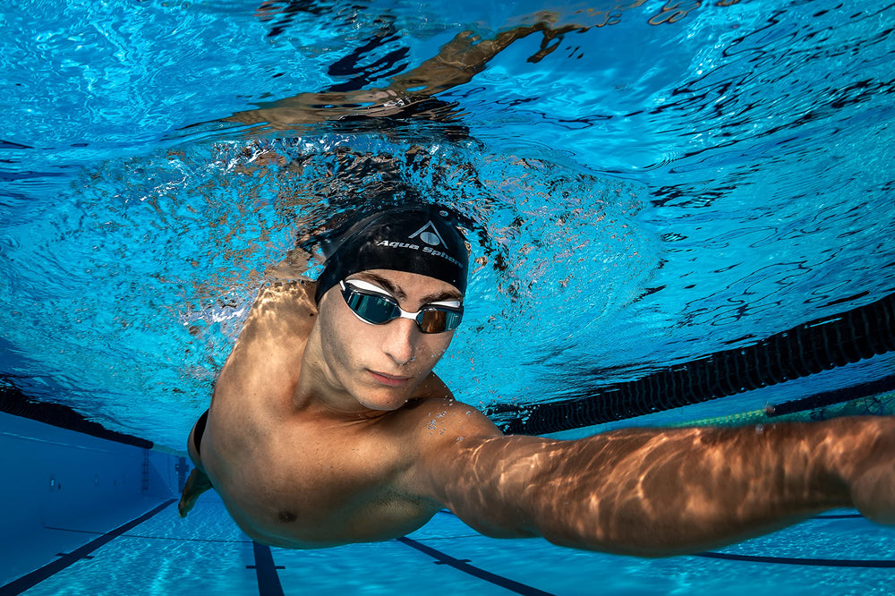 Aqua Sphere goggles worn in pool during race showing visibility and performance benefit