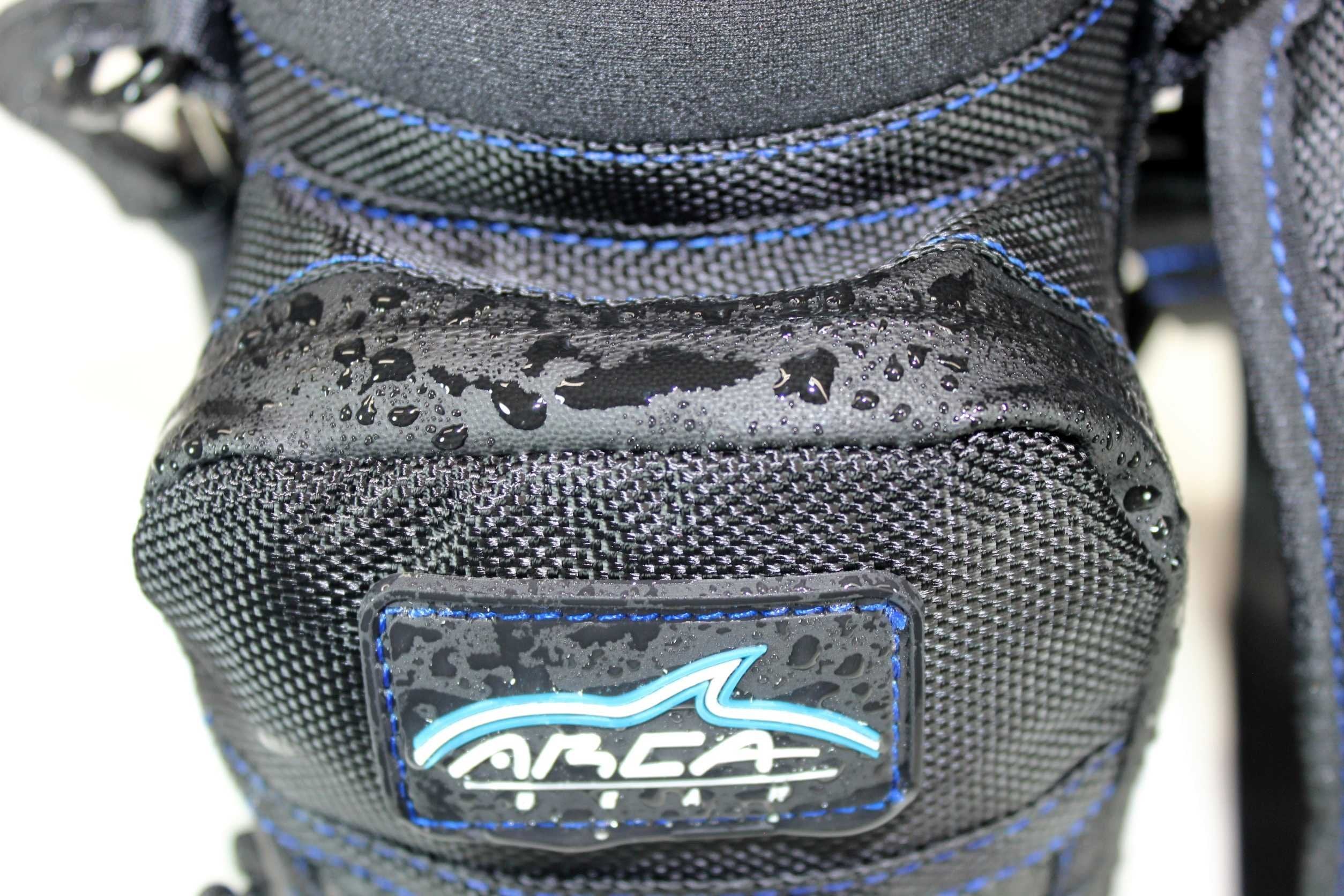 Arca lifestyle shot of the carrier on a park bench illustrating everyday convenience