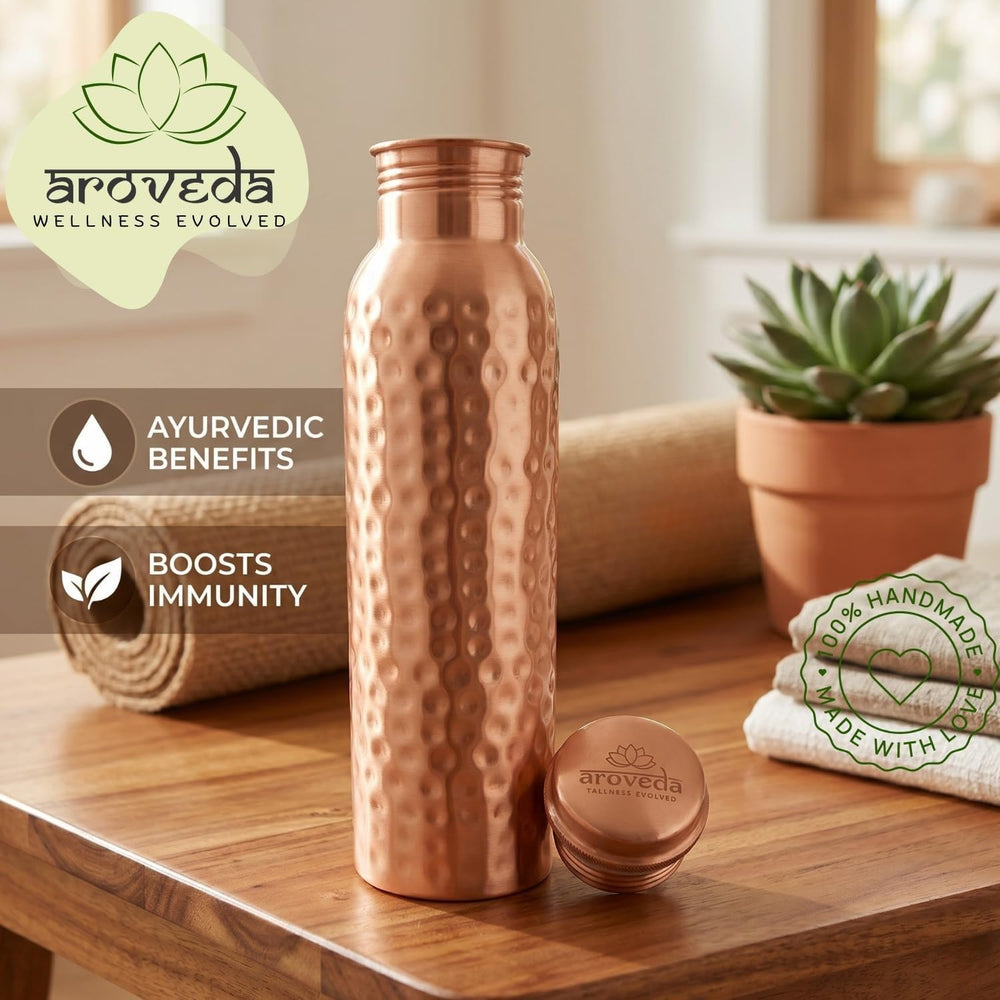 AROVEDA bottle next to ruler illustrating 32 oz scale and portable capacity