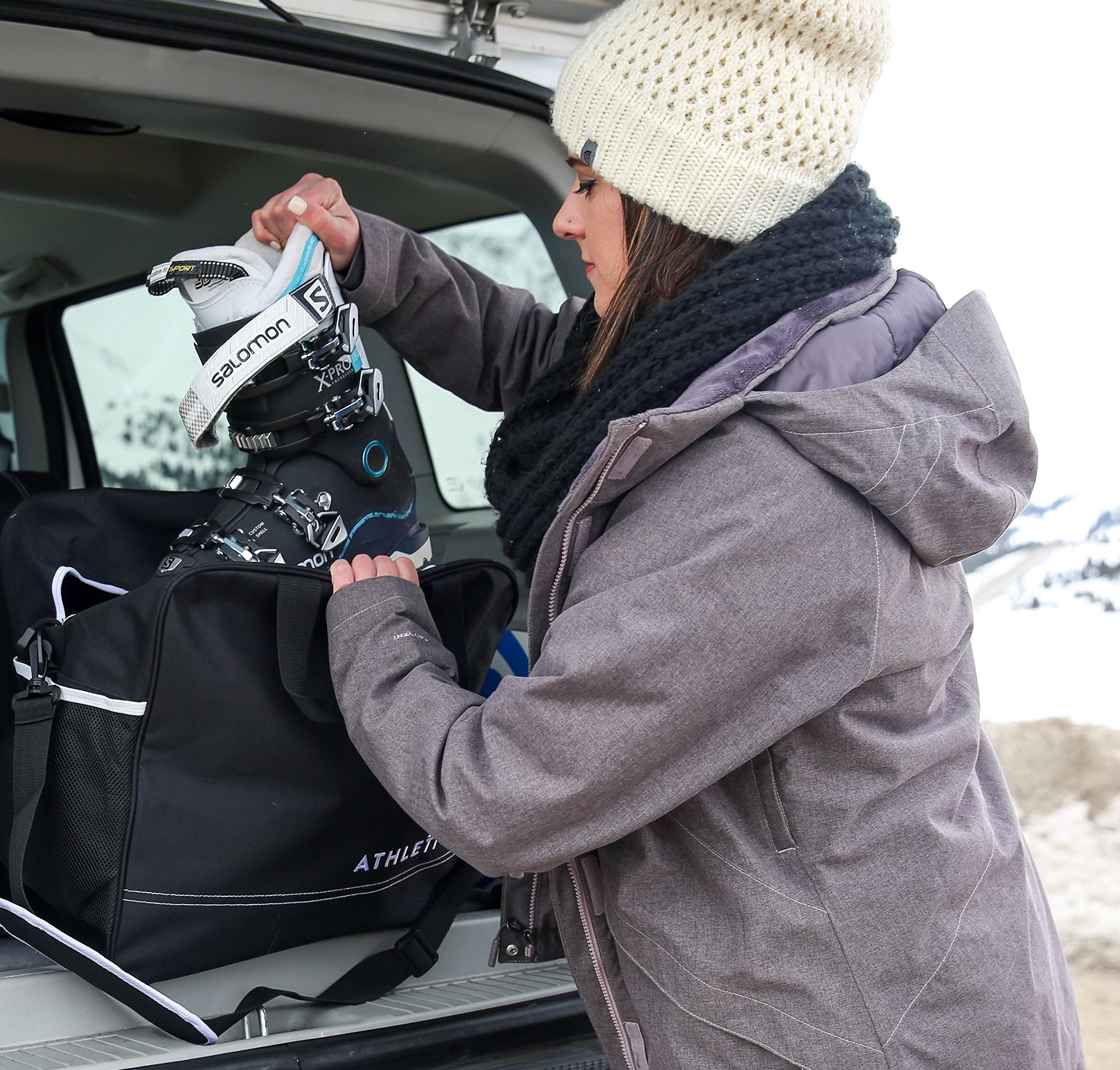 Athletico bags packed in a car trunk for efficient travel organization