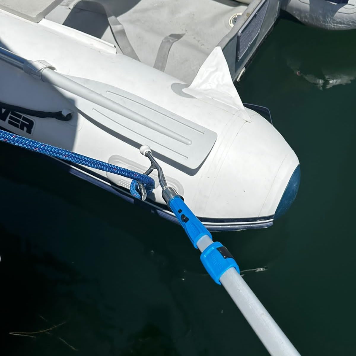 Avibo hook in use docking a boat holding a fender securely