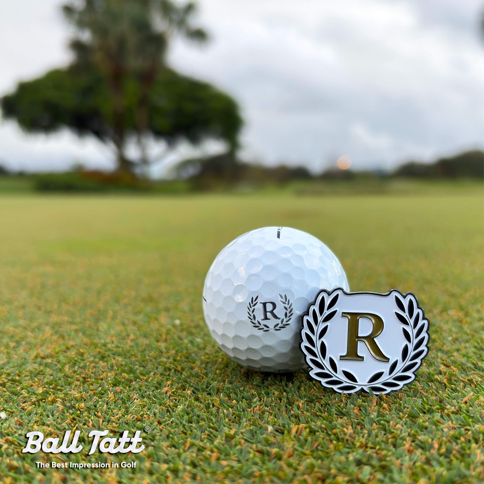 Ball Tatt close-up of printed monogram on golf ball offering clear identification