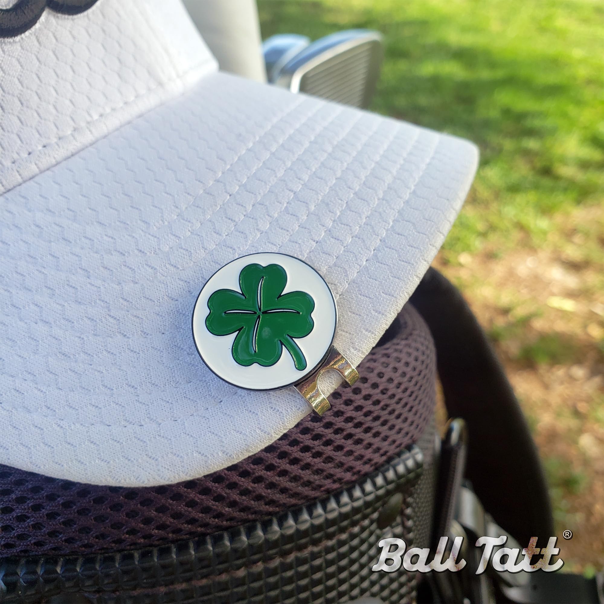 Ball Tatt next to a penny showing stamp and marker scale for accurate sizing benefit