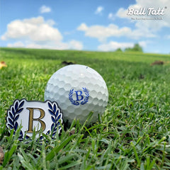 Ball Tatt stamping action on a golf ball demonstrating quick one-handed use benefit