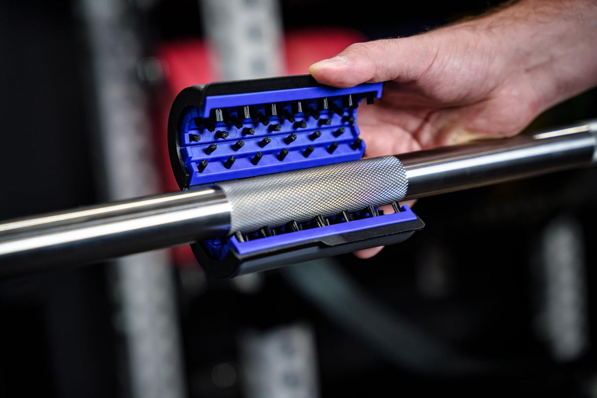 Barbell Rescue brush front view on bar showing compact design and easy handling