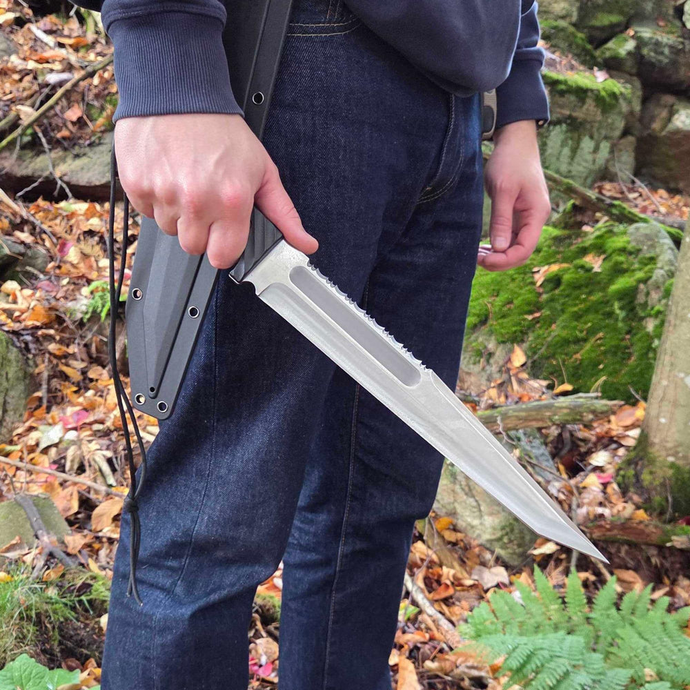 BATTLBOX BattlBolt in hand scale comparison showing ergonomic size for control