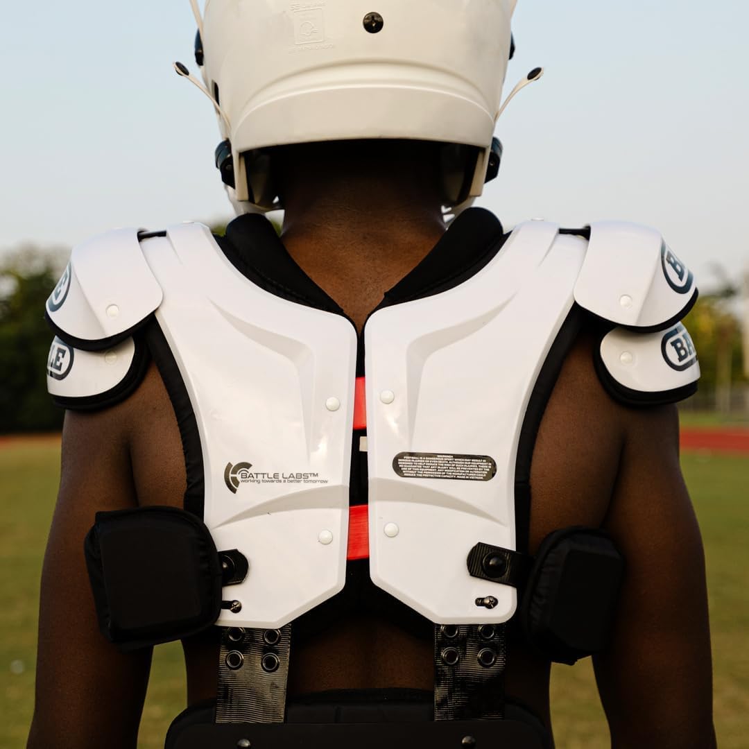 Battle Defender next to ruler showing compact lightweight sizing
