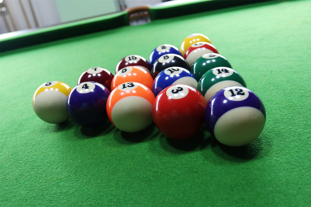 BETTERLINE cue ball beside numbered balls showing correct set layout and balance